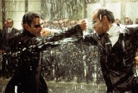 The Matrix movie image Keanu Reeves as Neo fighting The Matrix movie image Hugo Weaving Agent Smith